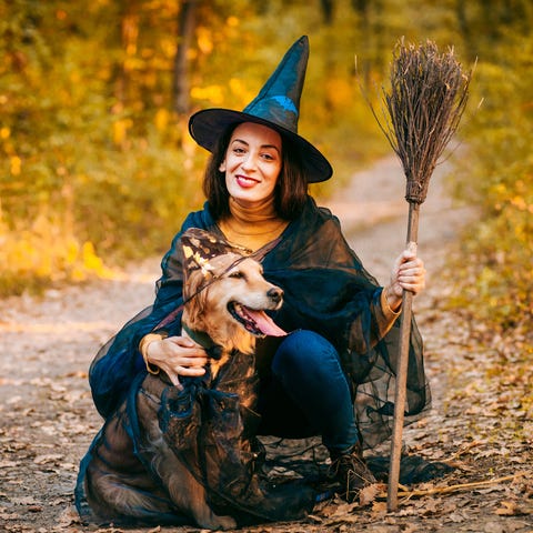 woman and dog costumed for halloween